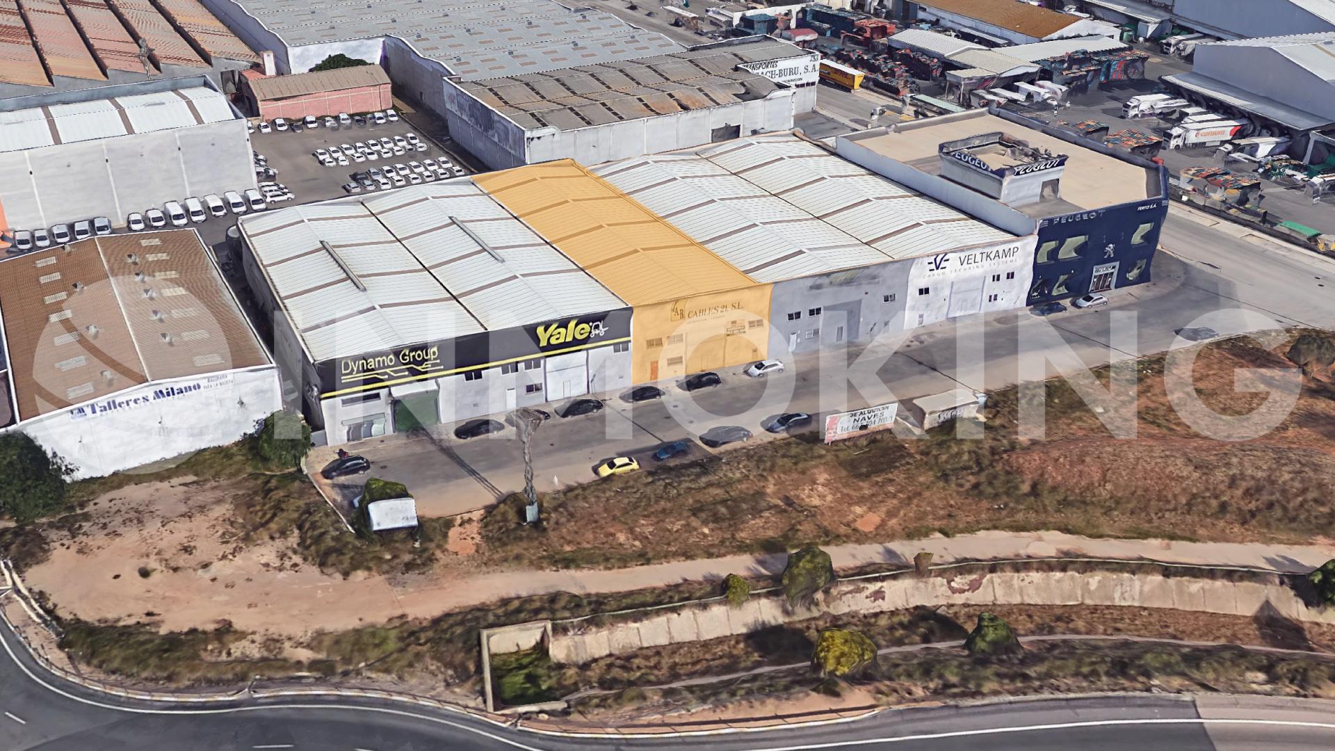 Foto de la propiedad Nave industrial en alquiler con oficinas sita en primera línea de la v-31